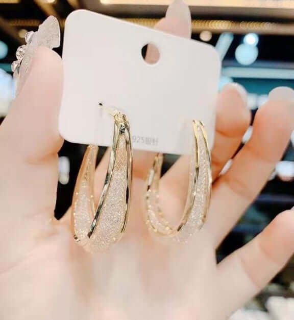 Ressa - Twisted Oval Hoop Earrings