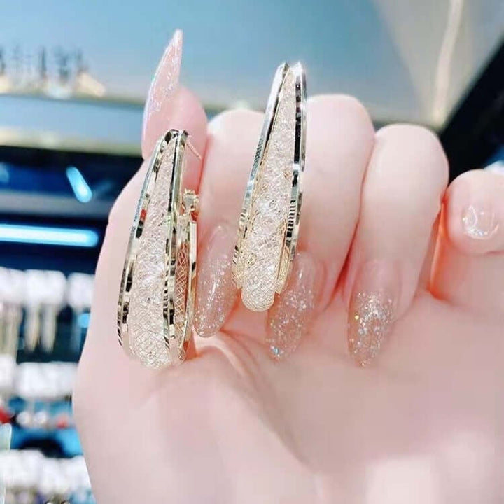 Ressa - Twisted Oval Hoop Earrings