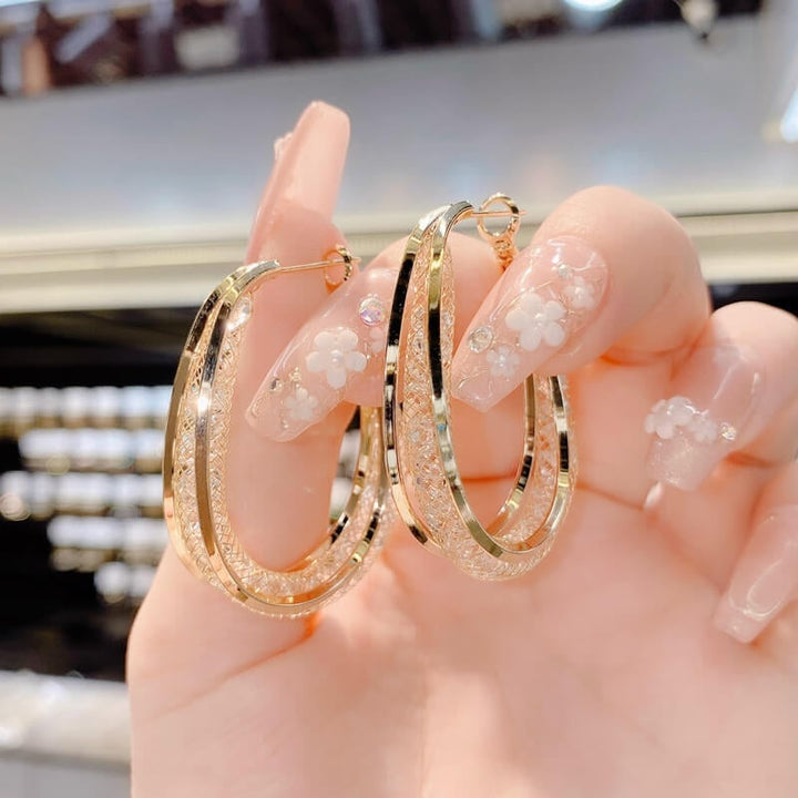 Ressa - Twisted Oval Hoop Earrings